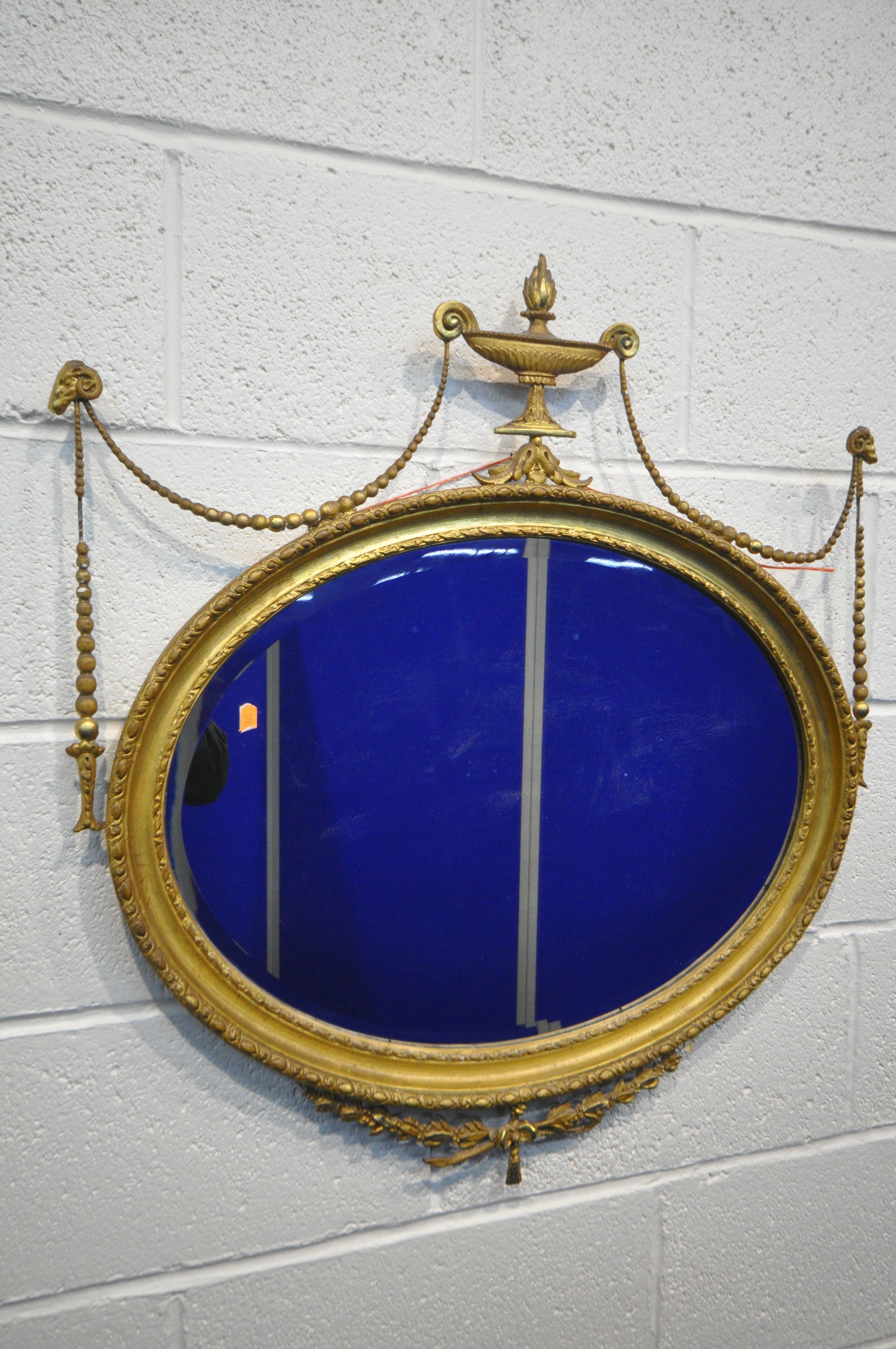 A NEOCLASSICAL GILTWOOD OVAL WALL MIRROR, 19th century, bevelled edge plate, with central surmount - Image 2 of 10