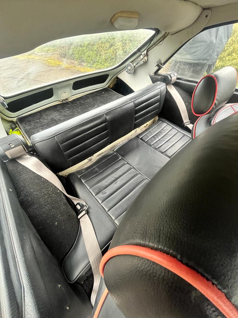 A BRITISH CLASSIC MGB GT SPORTS CAR, mark lll, in white and silvered trim, black leather and red - Image 13 of 24