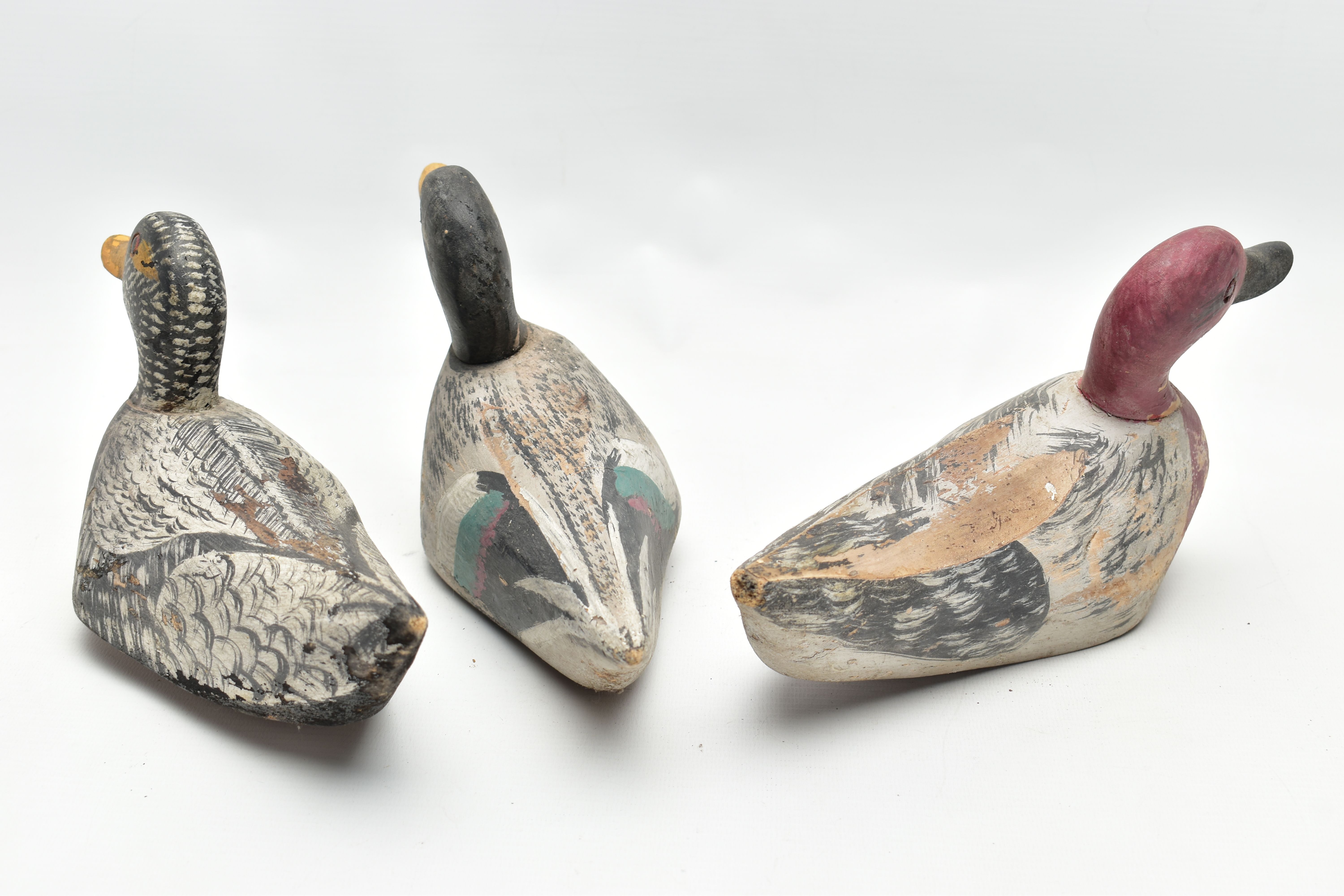 THREE CARVED WOODEN DECOY DUCKS WITH POLYCHROME PAINTED DECORATION, impressed circle eyes, - Image 6 of 8