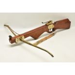 A CROSSBOW AND SEVEN WOODEN SHAFTS, Purchaser must be 18 years or over.