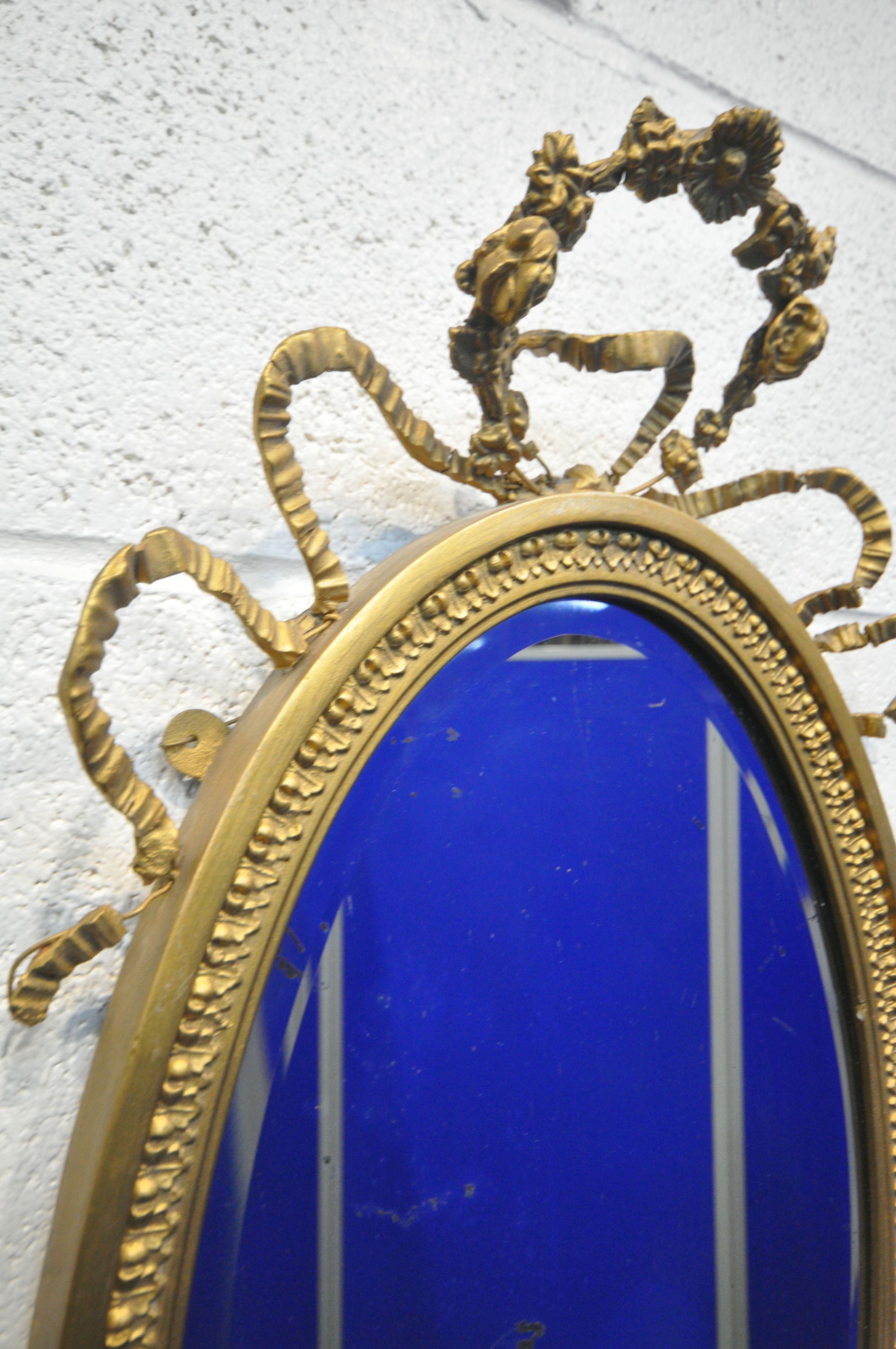 A NEOCLASSICAL GILTWOOD OVAL WALL MIRROR, 19th century, bevelled edge plate, with central surmount - Image 7 of 10