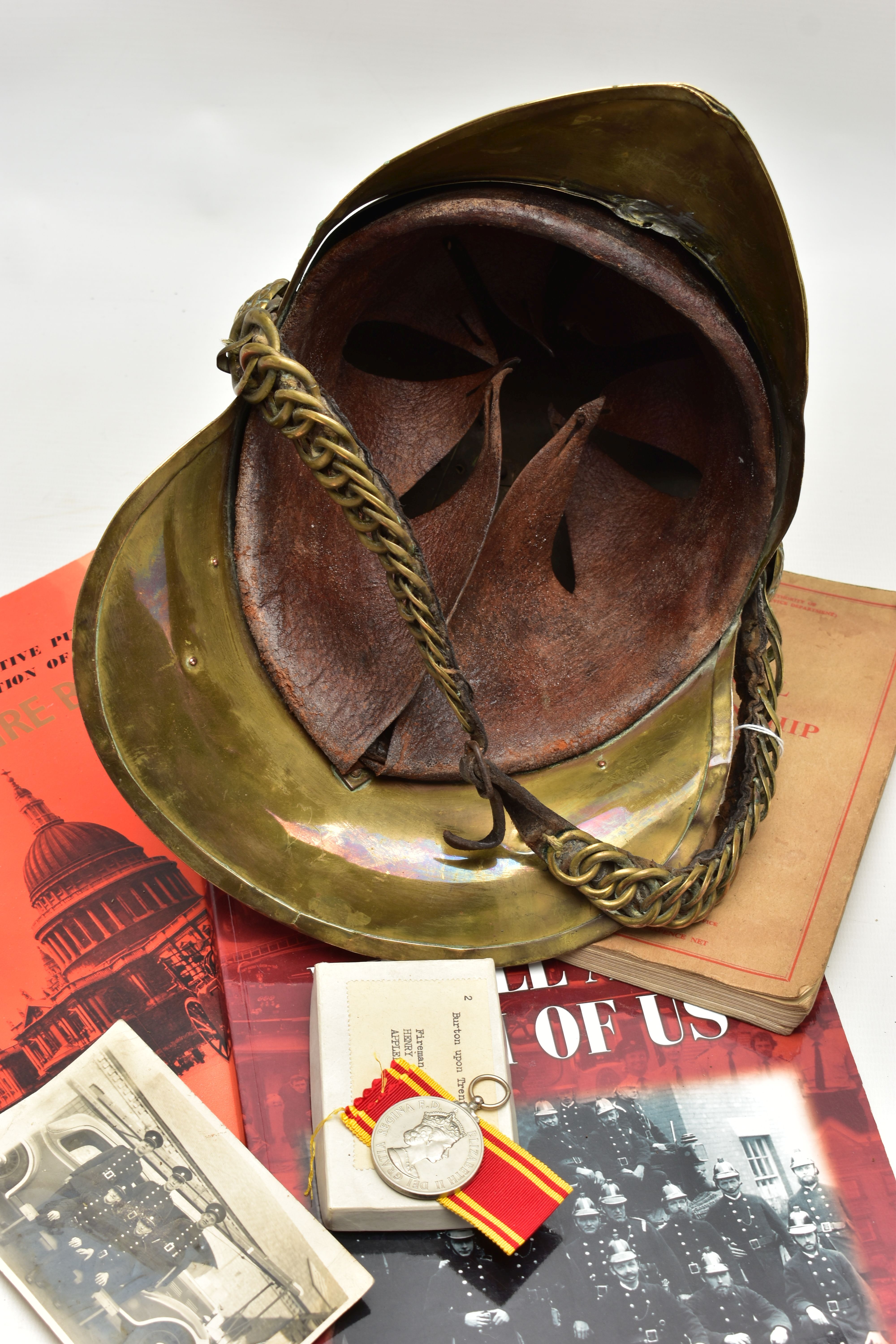 A VICTORIAN BRASS MERRYWEATHER TYPE FIREMAN'S HELMET, with a worn leather and brass chin strap and - Image 10 of 14