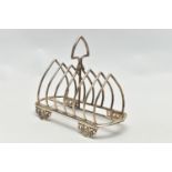 A VICTORIAN SILVER SIX DIVISION TOAST RACK, triangular handle with beaded decoration over seven