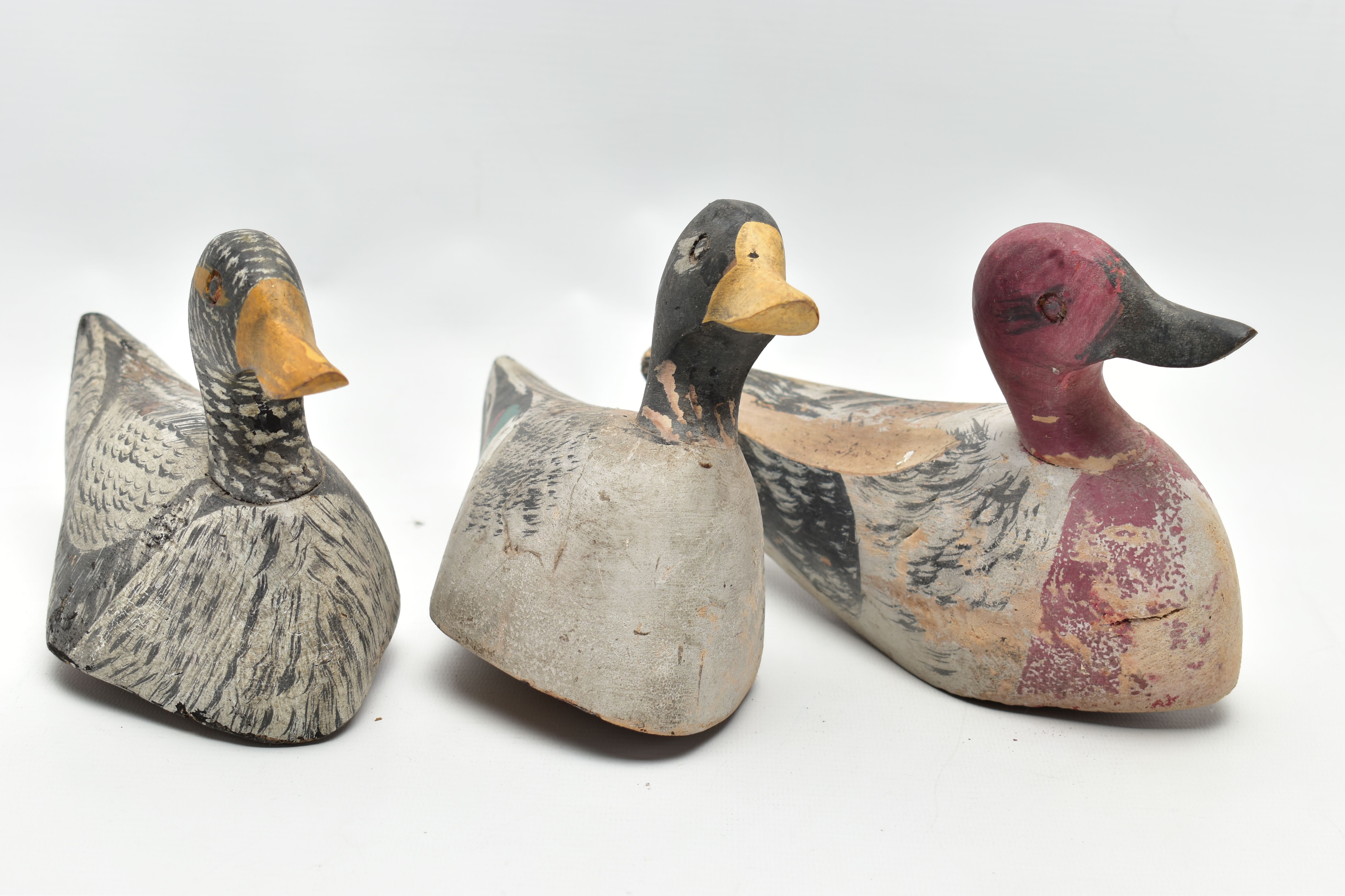 THREE CARVED WOODEN DECOY DUCKS WITH POLYCHROME PAINTED DECORATION, impressed circle eyes, - Image 3 of 8