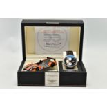 A RAIDILLON 'CONQUEST ENDURANCE' DAY DATE WRISTWATCH WITH PRESENTATION BOX, the watch with black