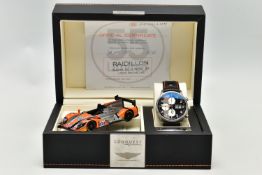 A RAIDILLON 'CONQUEST ENDURANCE' DAY DATE WRISTWATCH WITH PRESENTATION BOX, the watch with black