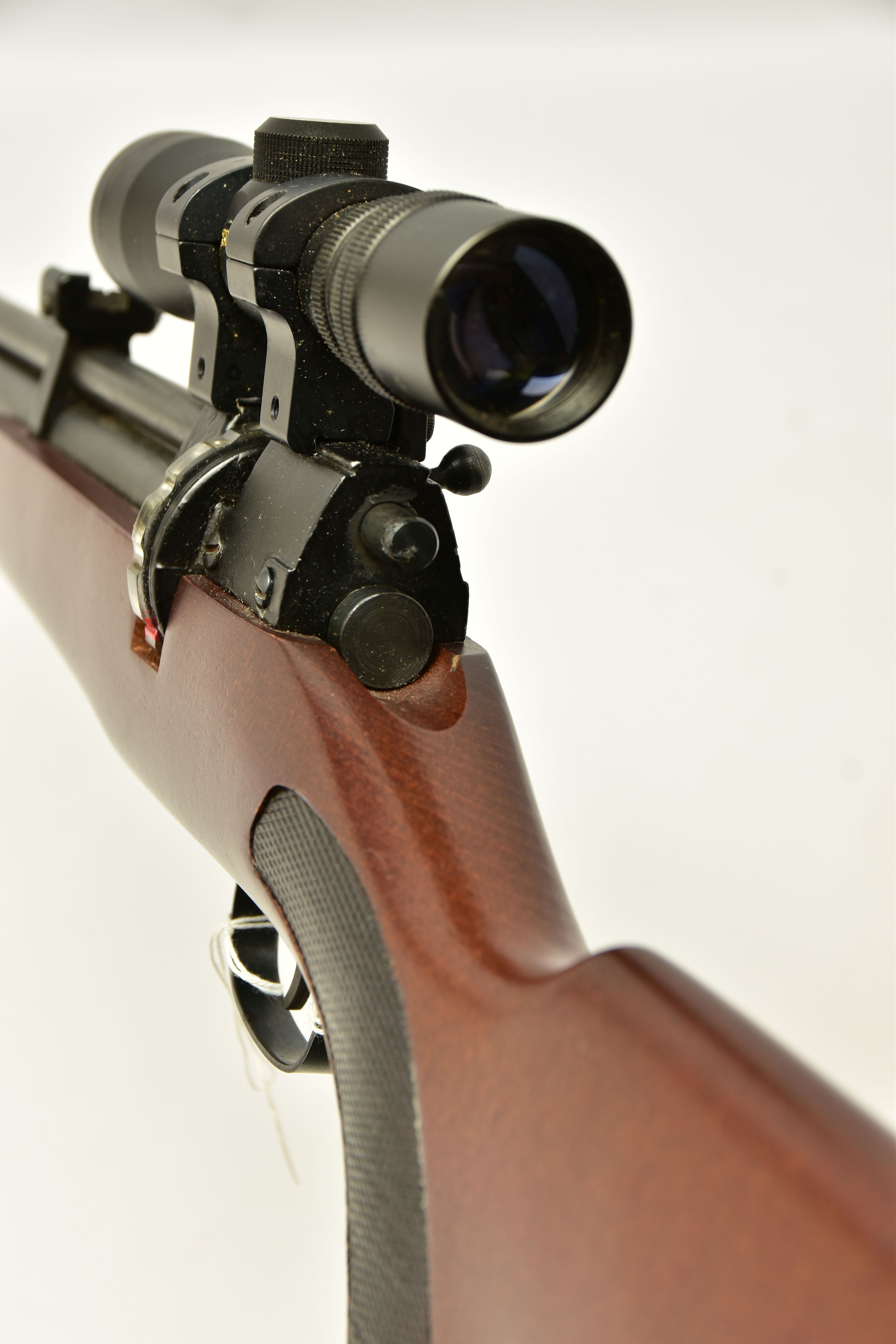 A .22 '' ROTARY MAGAZINE PUMP UP AIR RIFLE fitted with a beech stock, in working order and excellent - Image 8 of 9