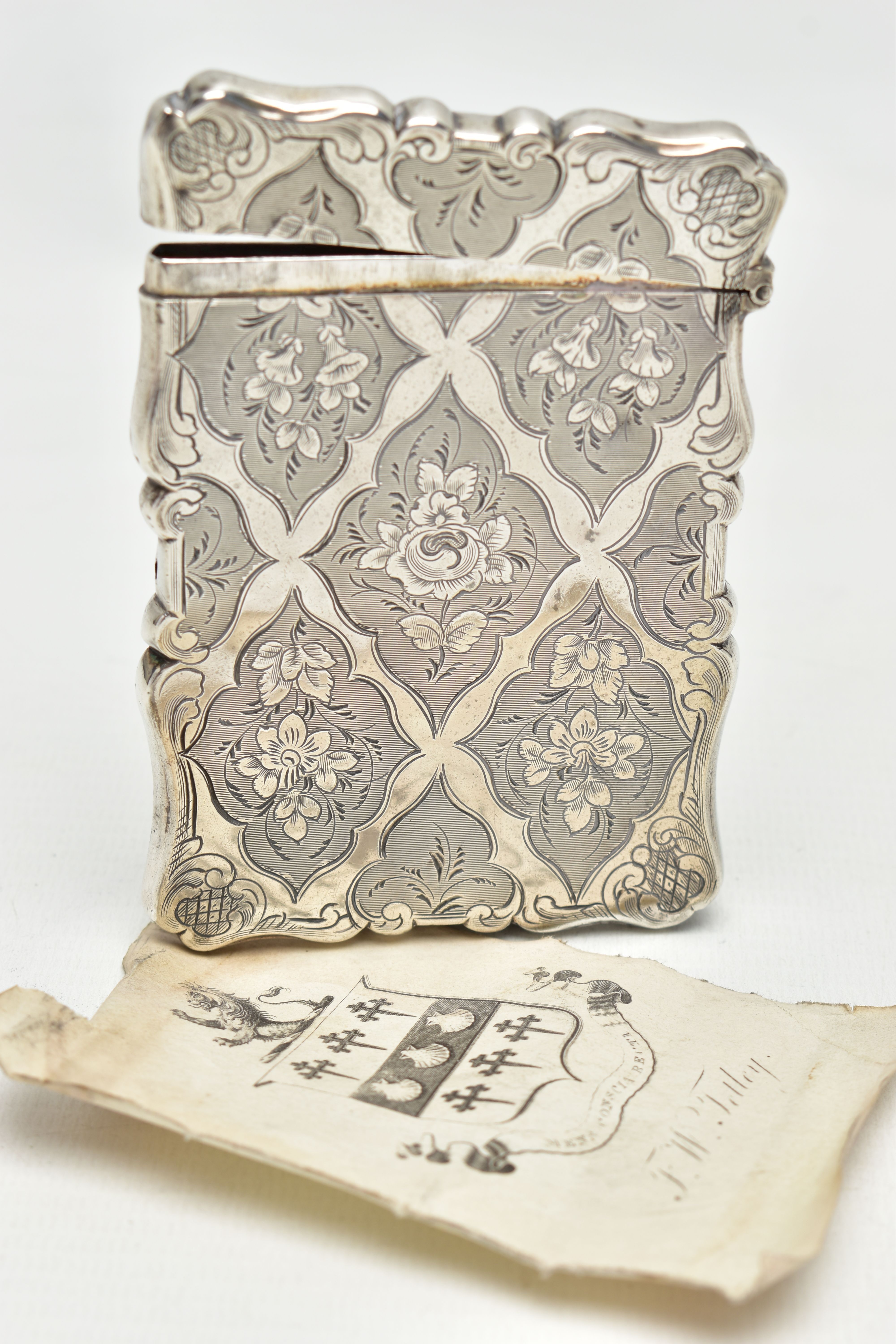 A VICTORIAN SILVER CARD CASE BY NATHANIEL MILLS, of scrolled rectangular outline, hinged top with - Image 4 of 4