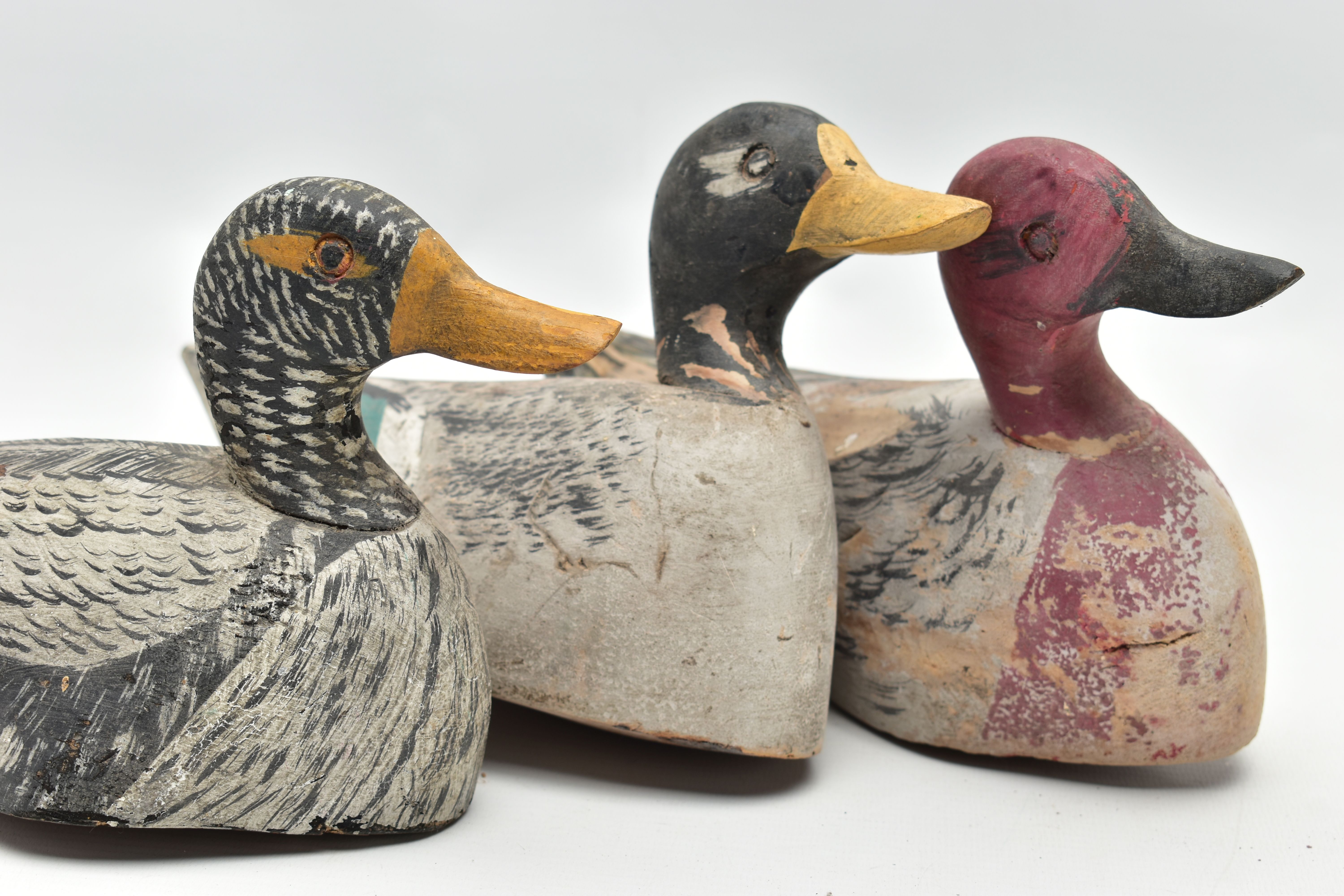 THREE CARVED WOODEN DECOY DUCKS WITH POLYCHROME PAINTED DECORATION, impressed circle eyes, - Image 7 of 8