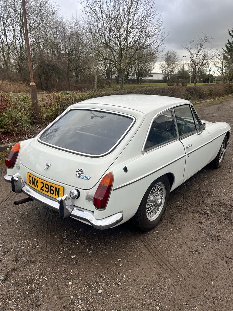 A BRITISH CLASSIC MGB GT SPORTS CAR, mark lll, in white and silvered trim, black leather and red - Image 8 of 24