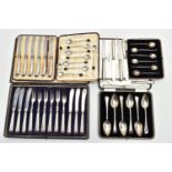 A PARCEL OF CASED AND LOOSE SILVER AND SILVER HANDLED CUTLERY AND FLATWARE, comprising a cased set