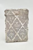 A VICTORIAN SILVER CARD CASE BY NATHANIEL MILLS, of scrolled rectangular outline, hinged top with