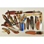 FOUR SHEATH KNIVES WITH SHEATHS, the first by Rostrei Soligen, two by J Howell & Sons, Sheffield,