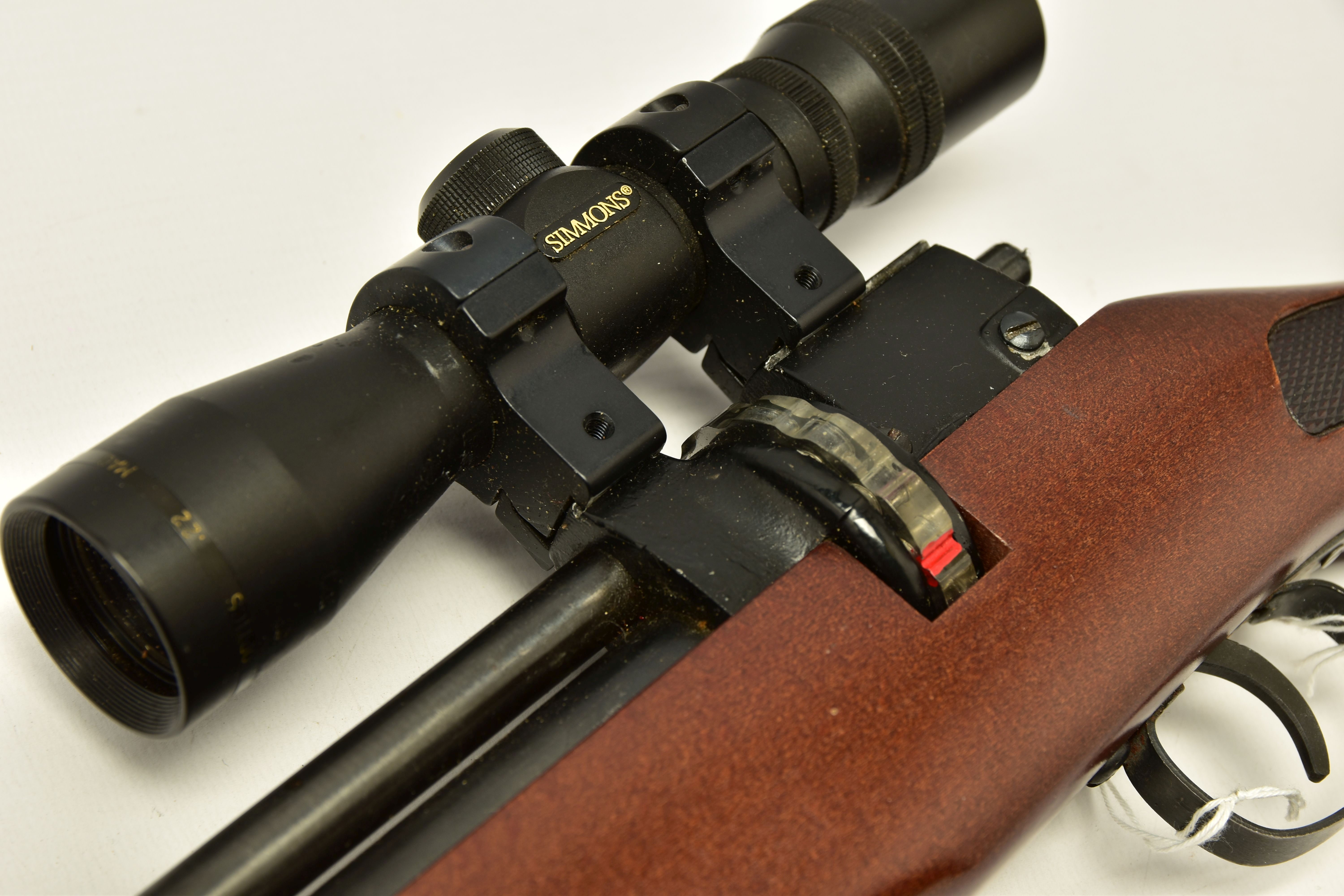 A .22 '' ROTARY MAGAZINE PUMP UP AIR RIFLE fitted with a beech stock, in working order and excellent - Image 7 of 9