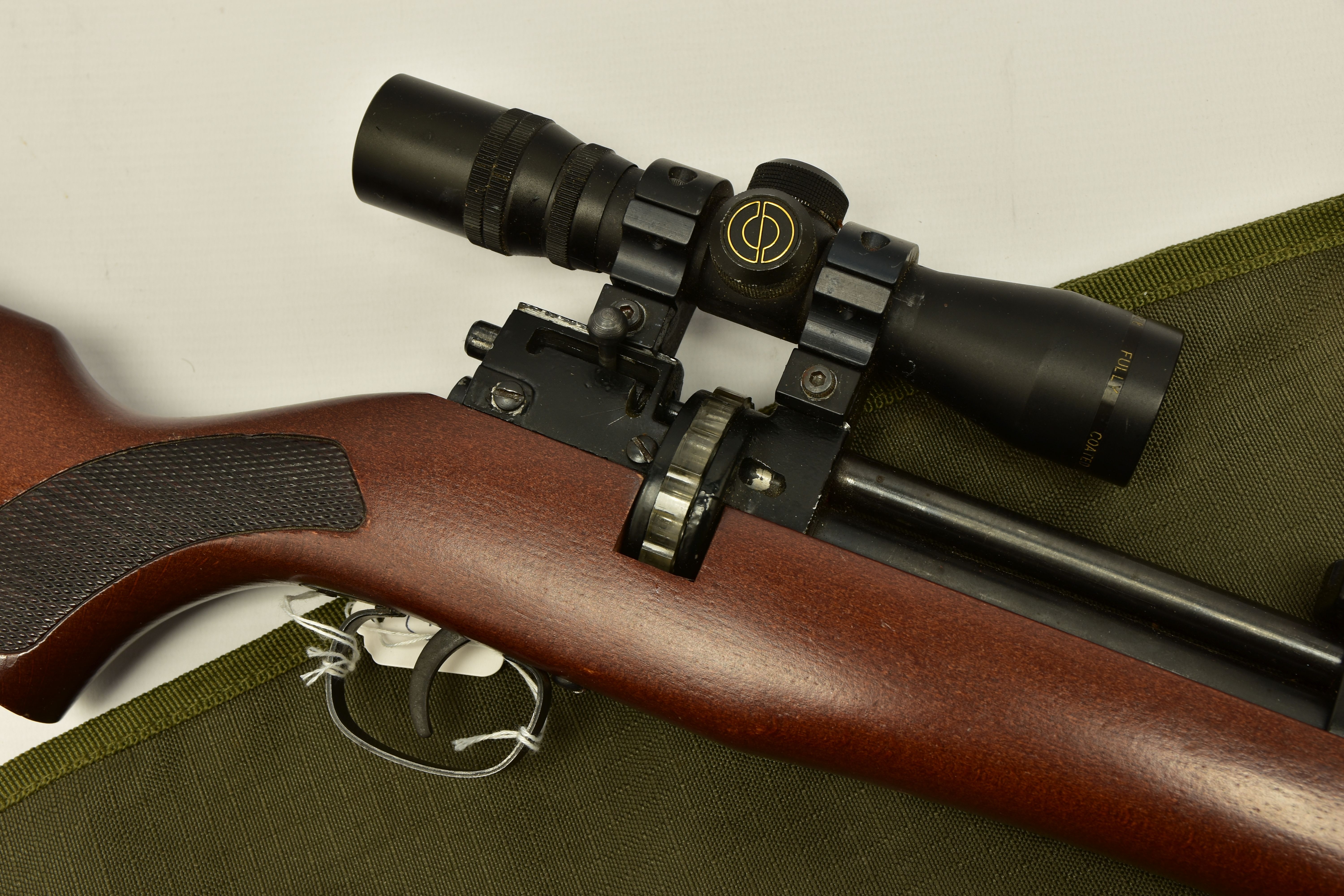 A .22 '' ROTARY MAGAZINE PUMP UP AIR RIFLE fitted with a beech stock, in working order and excellent - Image 4 of 9