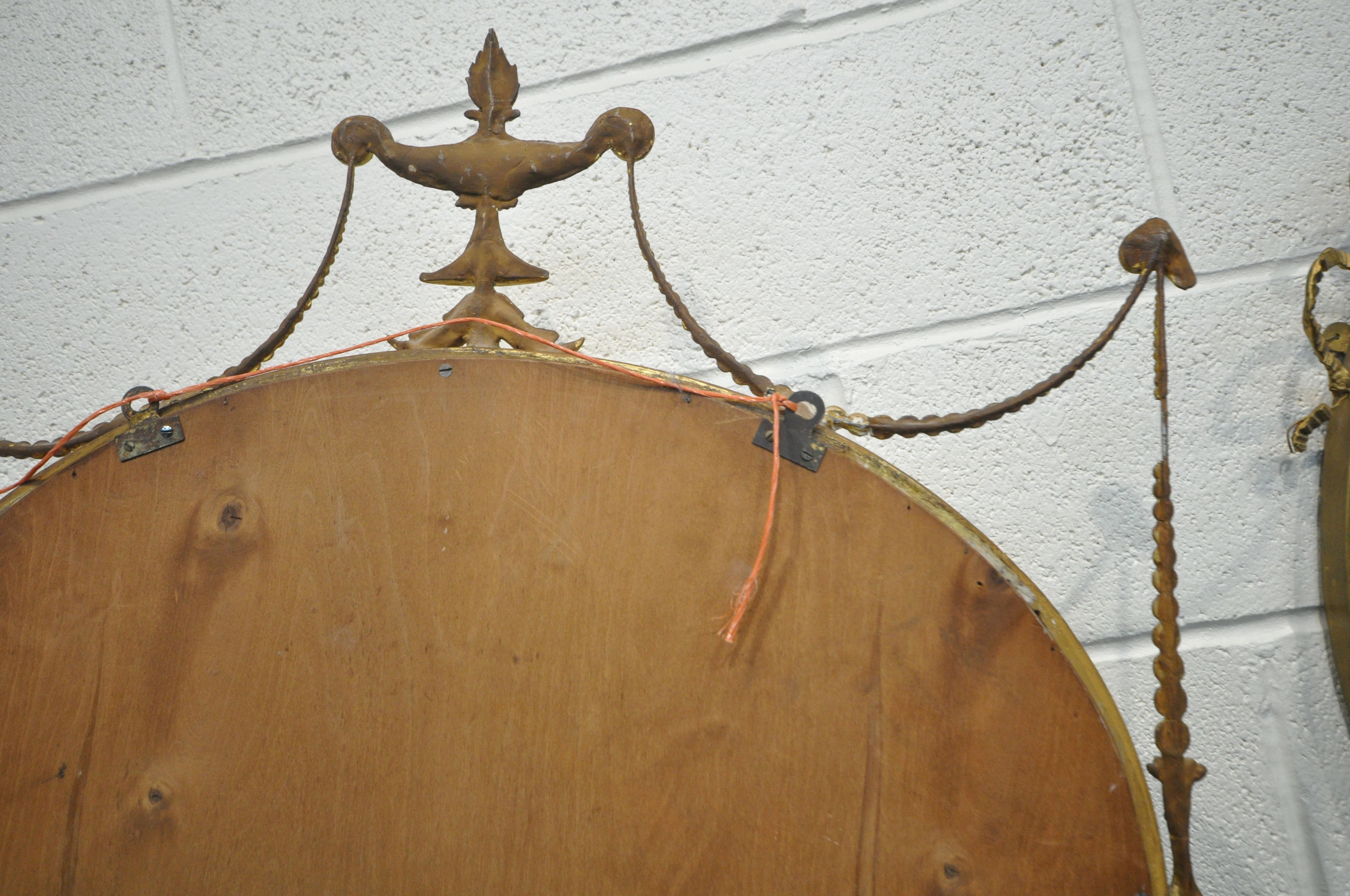 A NEOCLASSICAL GILTWOOD OVAL WALL MIRROR, 19th century, bevelled edge plate, with central surmount - Image 9 of 10