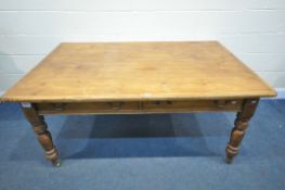 A LATE VICTORIAN AND LATER PINE KITCHEN TABLE, with two drawers, on turned legs, length 171cm x