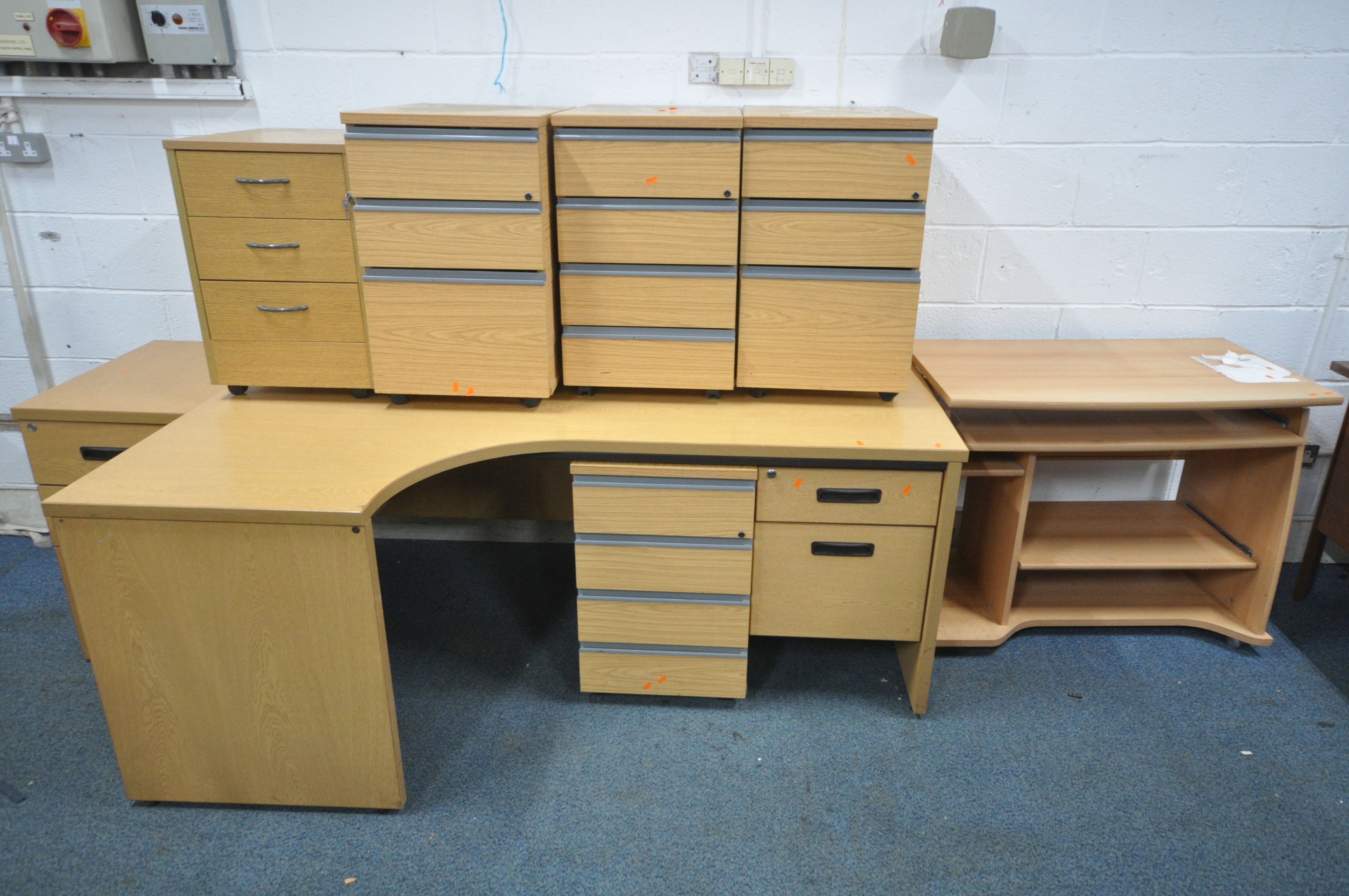 A LARGE SELECTION OF LIGHT WOOD OFFICE FURNITURE, to include six various desks and seven various