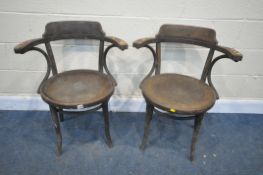 A PAIR OF BENTWOOD OAK ARMCHAIRS (condition:-seat slightly lifted to one chair, aged wear and