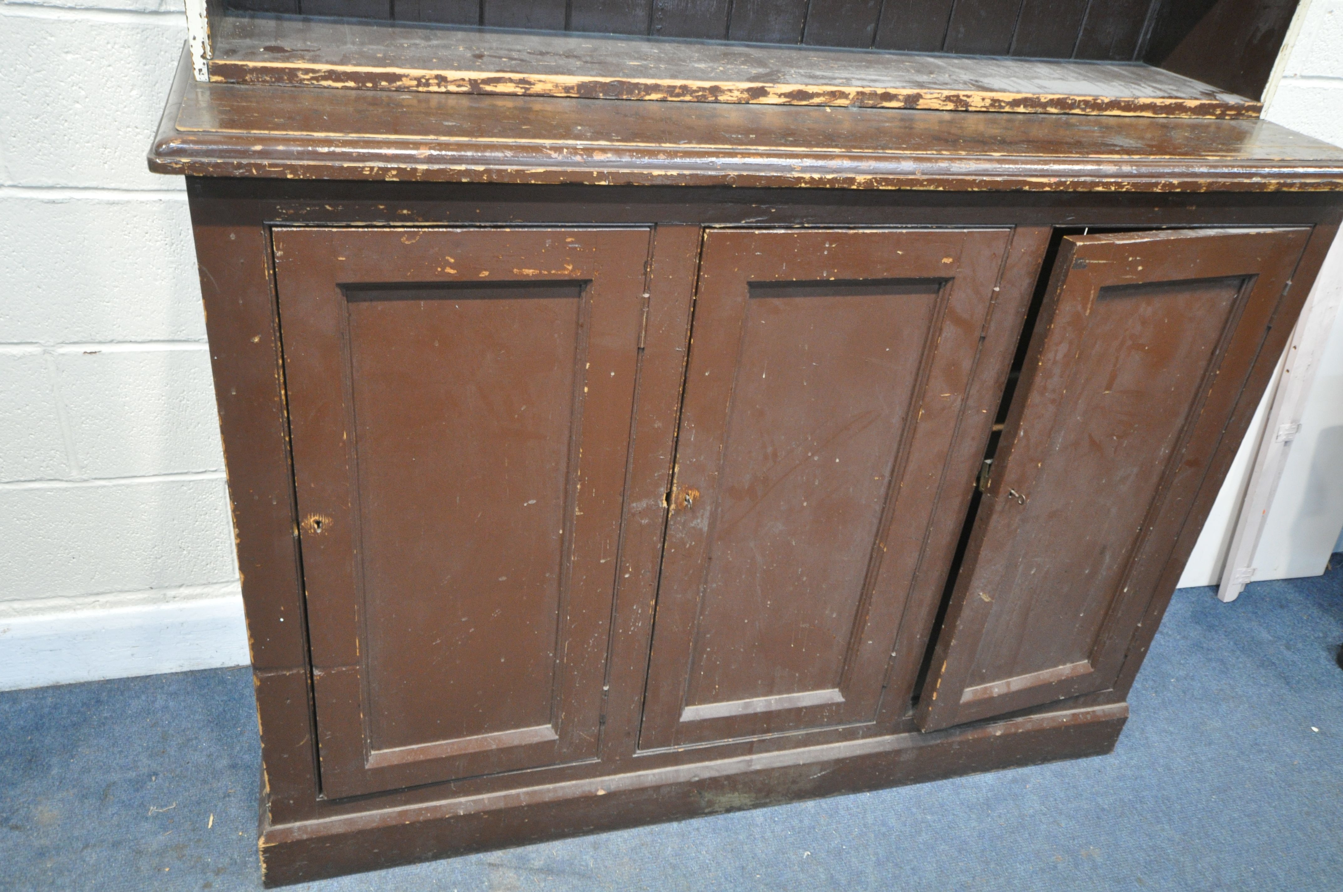 A 19TH CENTURY PAINTED PINE BOOKCASE, the open shelving top, above a base with triple panelled - Image 3 of 4