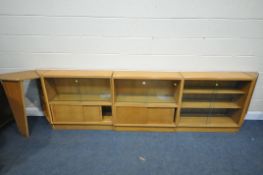 A SELECTION OF G PLAN OAK BOOKCASES, comprising three glazed bookcases, two corner open bookcases,