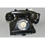 A BROWN BAKELITE TELEPHONE WITH DRAWER, recessed marks to the handset - 164 56, stencil marks to the