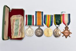 FOUR MILITARY MEDALDS AND A WOMENS SERVICE MEDAL, to include a WWI Victory medal and war medal