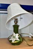 A MOORCROFT POTTERY BERMUDA LILY TABLE LAMP, of compressed baluster form, tube lined with white lily