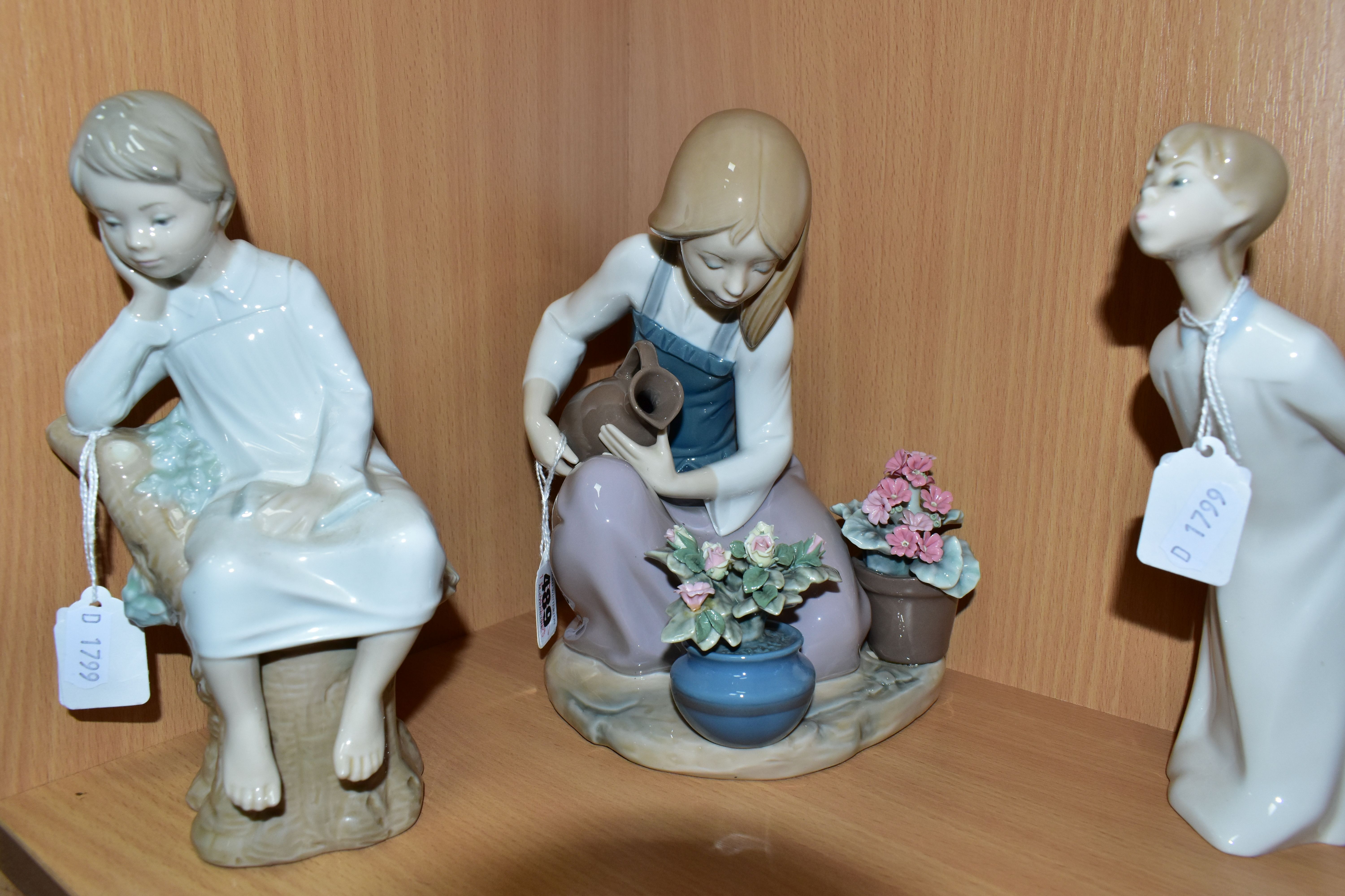FOUR LLADRO FIGURES, comprising 'Flower Song', a Lladro Museum Collectors Society 1988 figure, - Image 3 of 4
