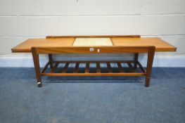 A MID CENTURY REMPLOY TEAK EXTENDING COFFEE TABLE, with a central tiles, extended length 143cm x