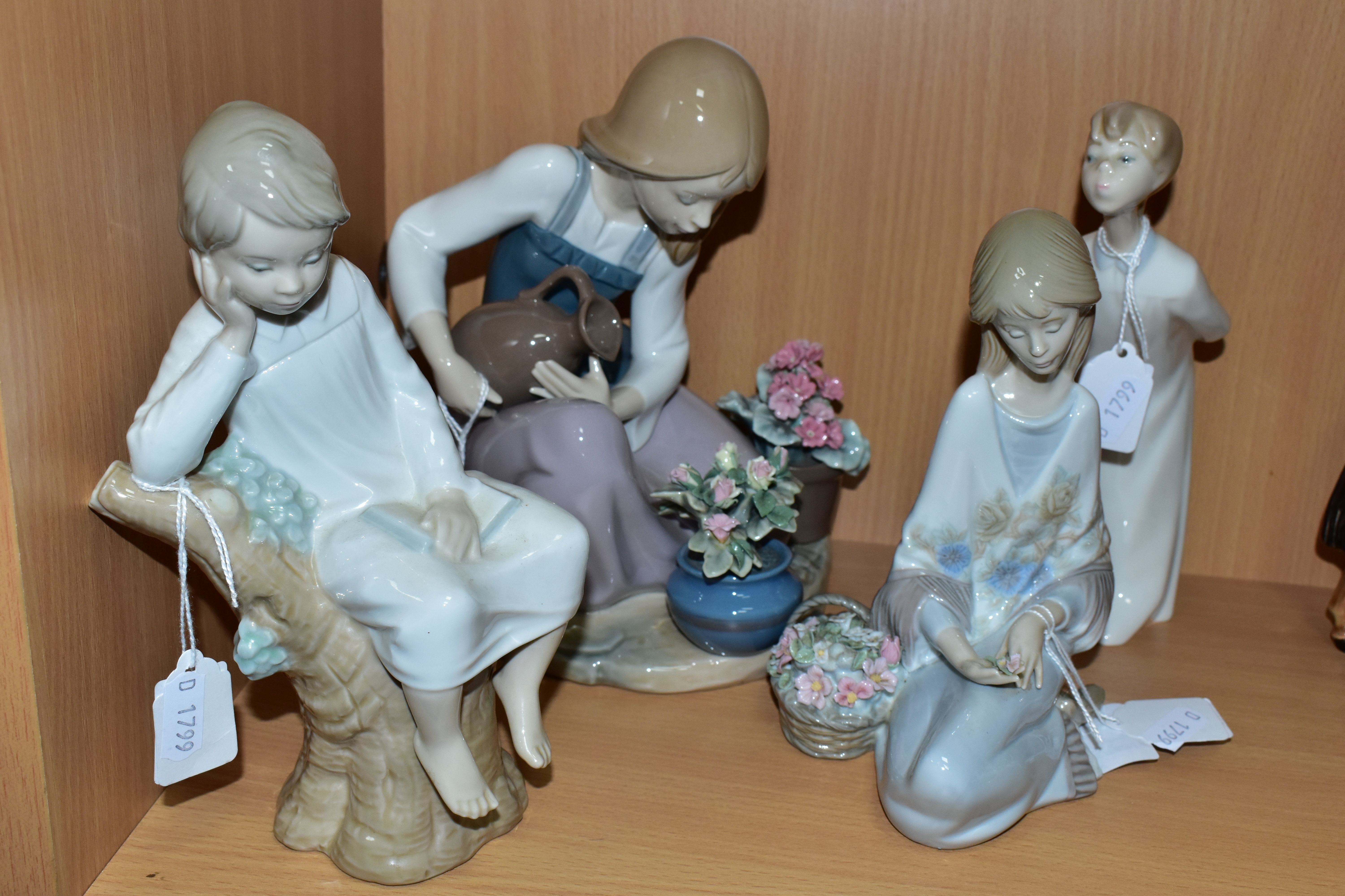 FOUR LLADRO FIGURES, comprising 'Flower Song', a Lladro Museum Collectors Society 1988 figure,