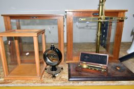 A GROUP OF BALANCE SCALES AND EMPTY GLASS CASES, comprising a wooden cased saccharometer No. 4073 by