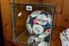 A SEALED GLASS CASE CONTAINING A SIGNED FOOTBALL, from the 2015 UEFA Champions League Cup Final