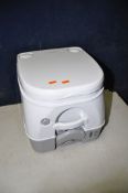 A DOMETIC PORTABLE TOILET (very good condition)