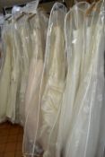 TWENTY WEDDING DRESSES, retail stock clearance (may have marks and minor damage) varying in styles