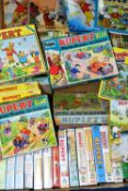 RUPERT, two boxes containing over forty Rupert Annuals, 1960's onwards, stories, puzzle books, 'A