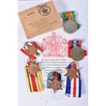 A BOXED SET OF WWII MEDALS to include, a 1935-1945 Star and War medal, a Defence medal and Italy,
