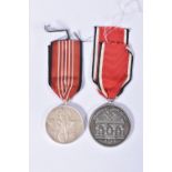 A NSDAP BLOOD ORDER MEDAL AND A 1936 OLYMPIC MEDAL, the blood order is officially known as the