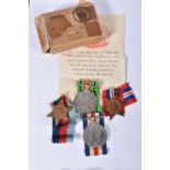 A BOXED SET OF WWII MEDALS COMPLETE WITH ENTITLEMENT SLIP, the medals are un-named as issued and