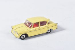 AN UNBOXED DINKY TOYS SINGER VOGUE, No.145, rarer version with yellow body, red interior, playworn