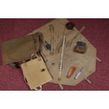 TWO WWII DATED MILITARY BAGS, to include a TANGYE ARP badge, folding knife, tape measure etc, the