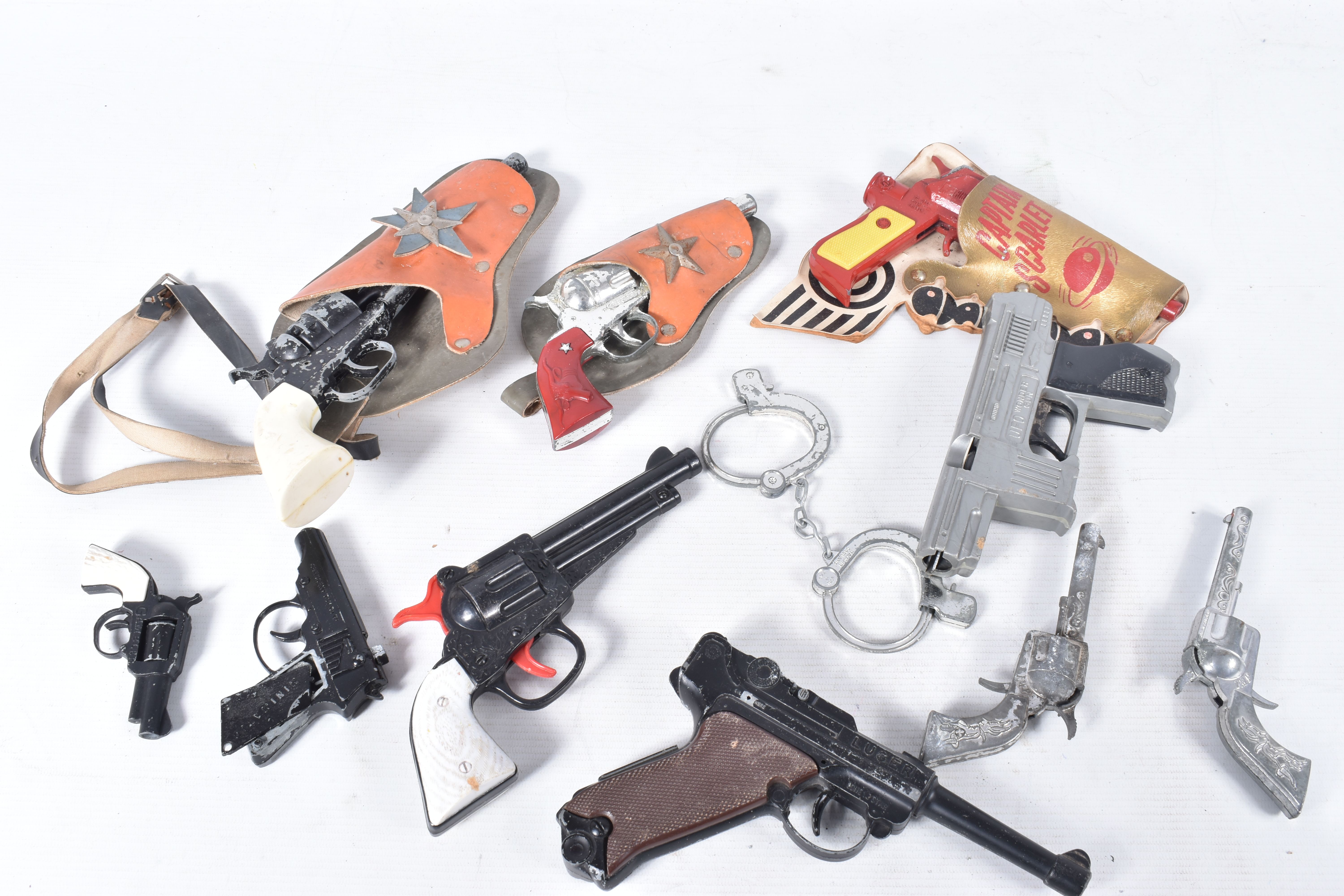 A DIECAST LONE STAR CAPTAIN SCARLET CAP GUN AND HOLSTER, with a collection of other diecast and