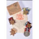 A BOXED SET OF WWII ROYAL NAVY MEDALS to include a 1939 - 1945 Star and War medal, Atlantic Star,