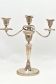 A GEORGE V SILVER THREE LIGHT CANDELABRUM OF NEO-CLASSICAL STYLE, the oval removable sconces and
