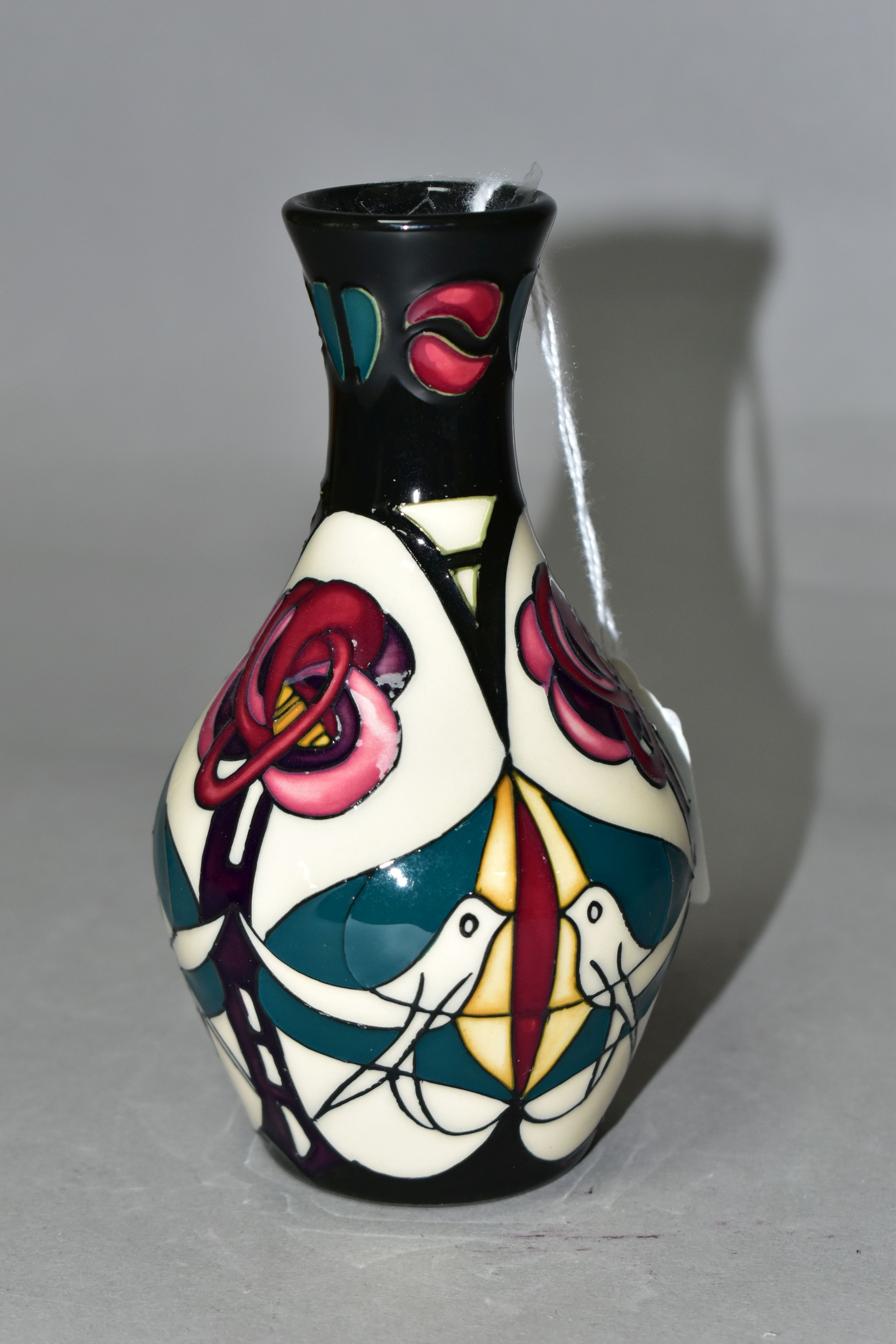 A MOORCROFT POTTERY 'MELODY' PATTERN, bud vase with original box, designed by Sian Leaper, decorated - Image 3 of 5