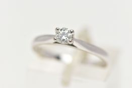 A 18CT GOLD SINGLE STONE DIAMOND RING, a round brilliant cut diamond, approximate total diamond