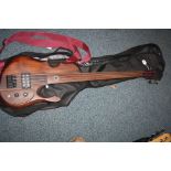 A HANDBUILT FRETLESS BASS GUITAR (possibly Stradi ) with hardwood body and through body neck,