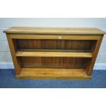 A LOW LIGHT OAK OPEN BOOKCASE, with a single shelf, width 137cm x depth 31cm x height 88cm (