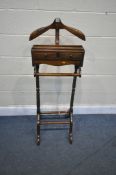 A REPRODUCTION HARDWOOD VALET STAND, with two small drawers, height 125cm (condition:-good