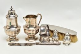 A SMALL PARCEL OF 20TH CENTURY SILVER, comprising a George V sugar caster and matching cream jug